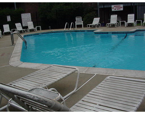 130 Sutherland Road, Unit 12 130 Boston, MA 02135 - Photo 2 of 3 a view of a backyard with table and chairs