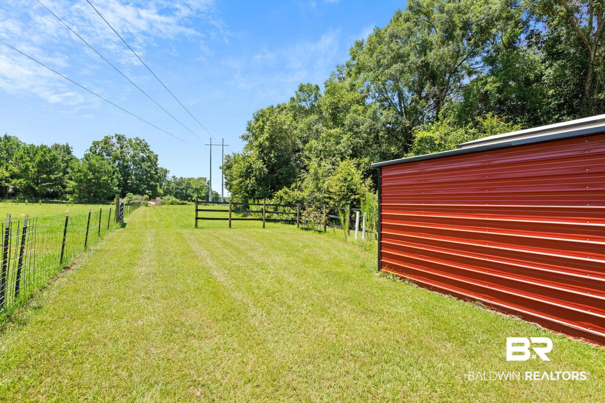 10703 South Ridge Drive Semmes, AL 36575 - Photo 6 of 37 View of yard featuring a view of countryside