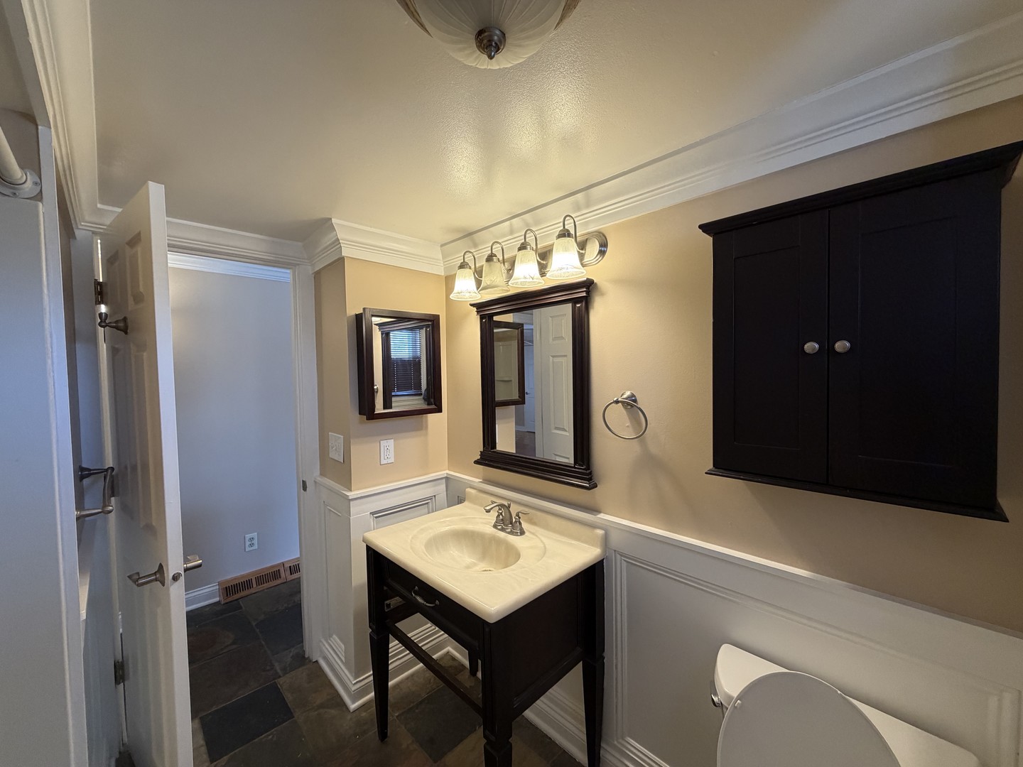 11614 West Algonquin Road, Unit 2B Huntley, IL 60142 - Photo 9 of 14 a bathroom with a sink a mirror and shower