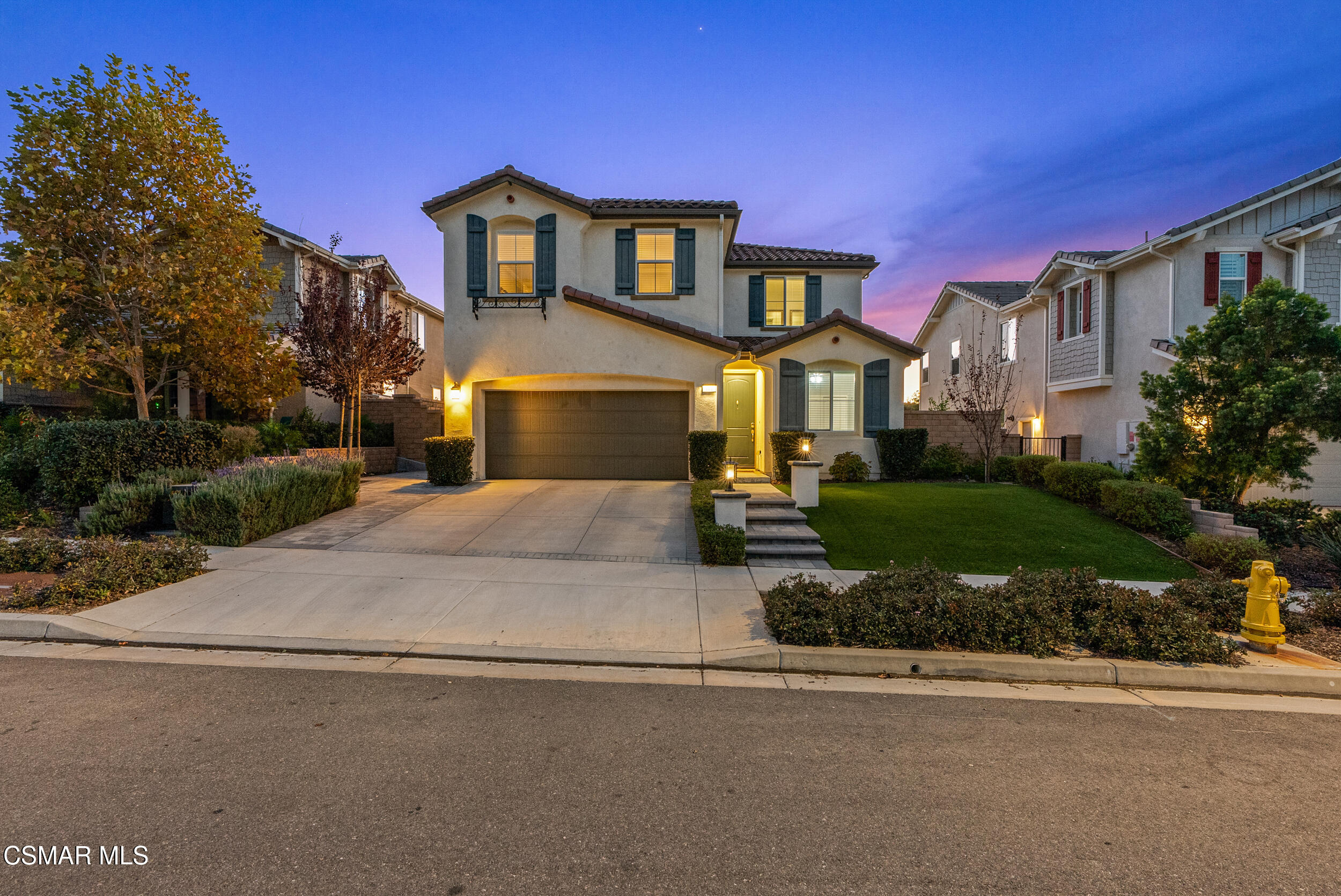 161 White Bark Lane Simi Valley, CA 93065 - Photo 2 of 83 a front view of a house with a yard and garage