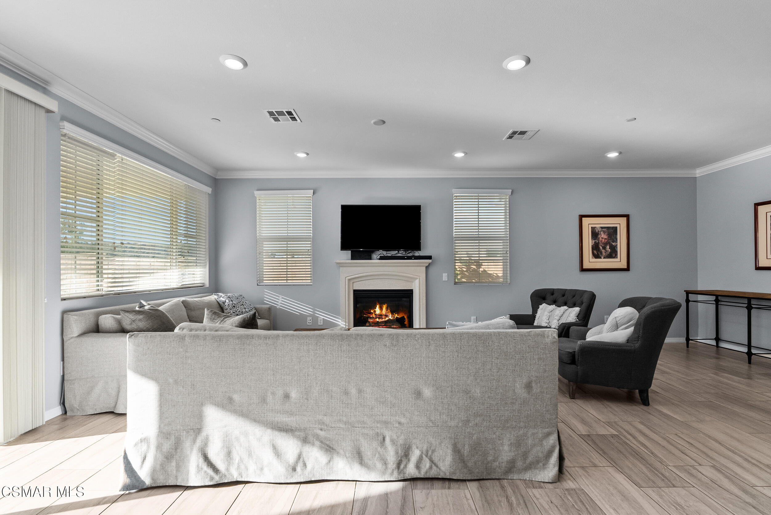 161 White Bark Lane Simi Valley, CA 93065 - Photo 25 of 83 a living room with fireplace furniture and a flat screen tv