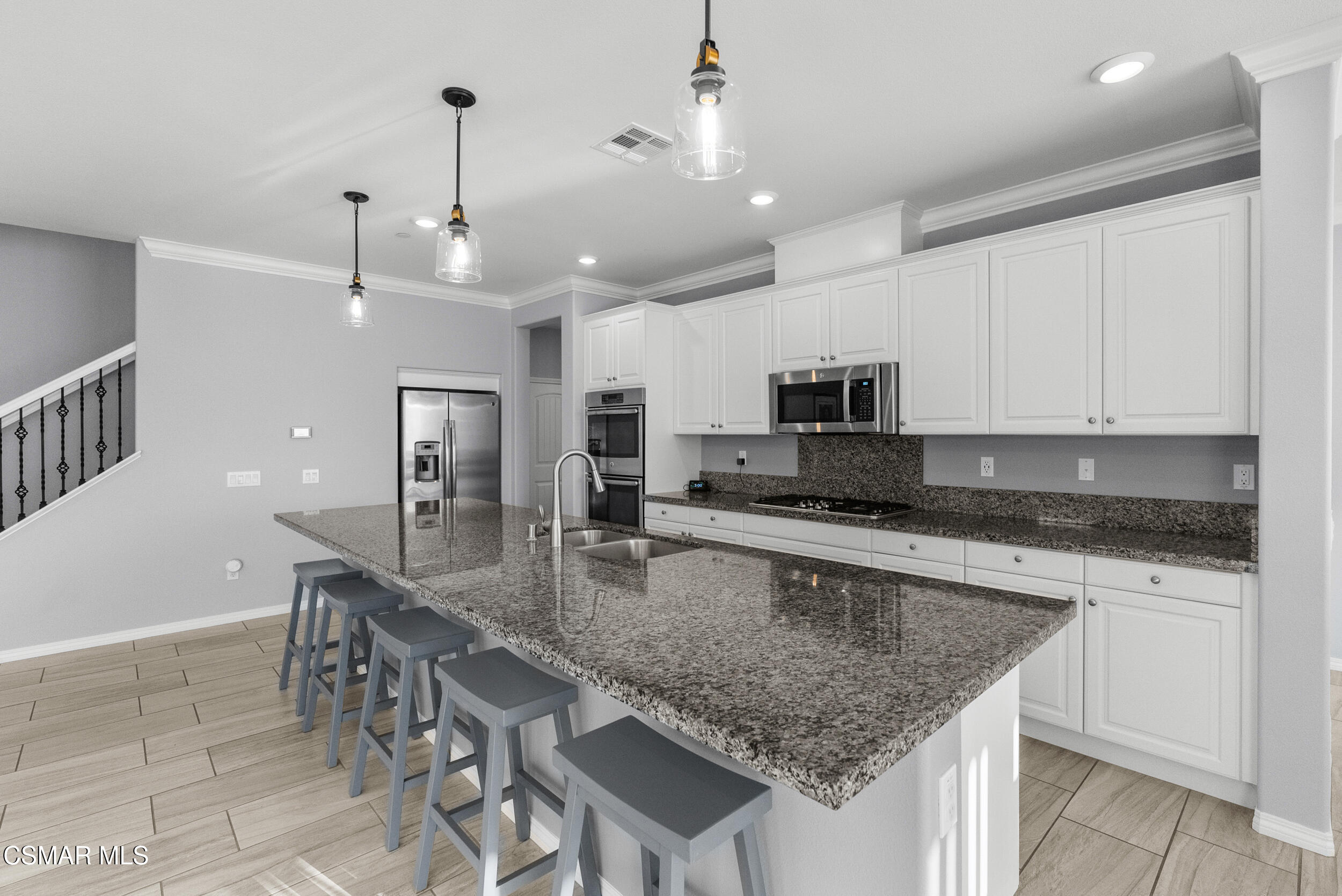 161 White Bark Lane Simi Valley, CA 93065 - Photo 30 of 83 a kitchen with stainless steel appliances granite countertop a sink counter space and cabinets