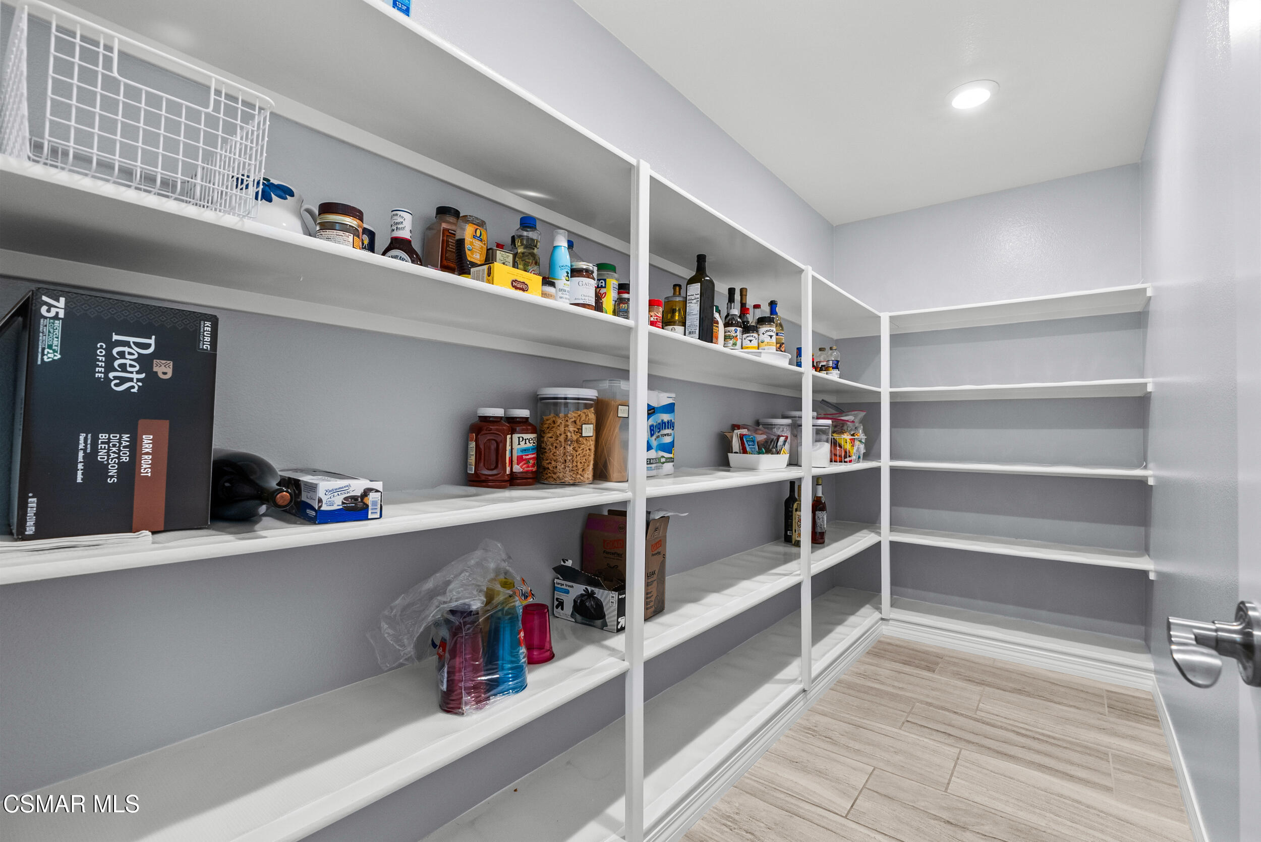 161 White Bark Lane Simi Valley, CA 93065 - Photo 37 of 83 a view of shelves in a room