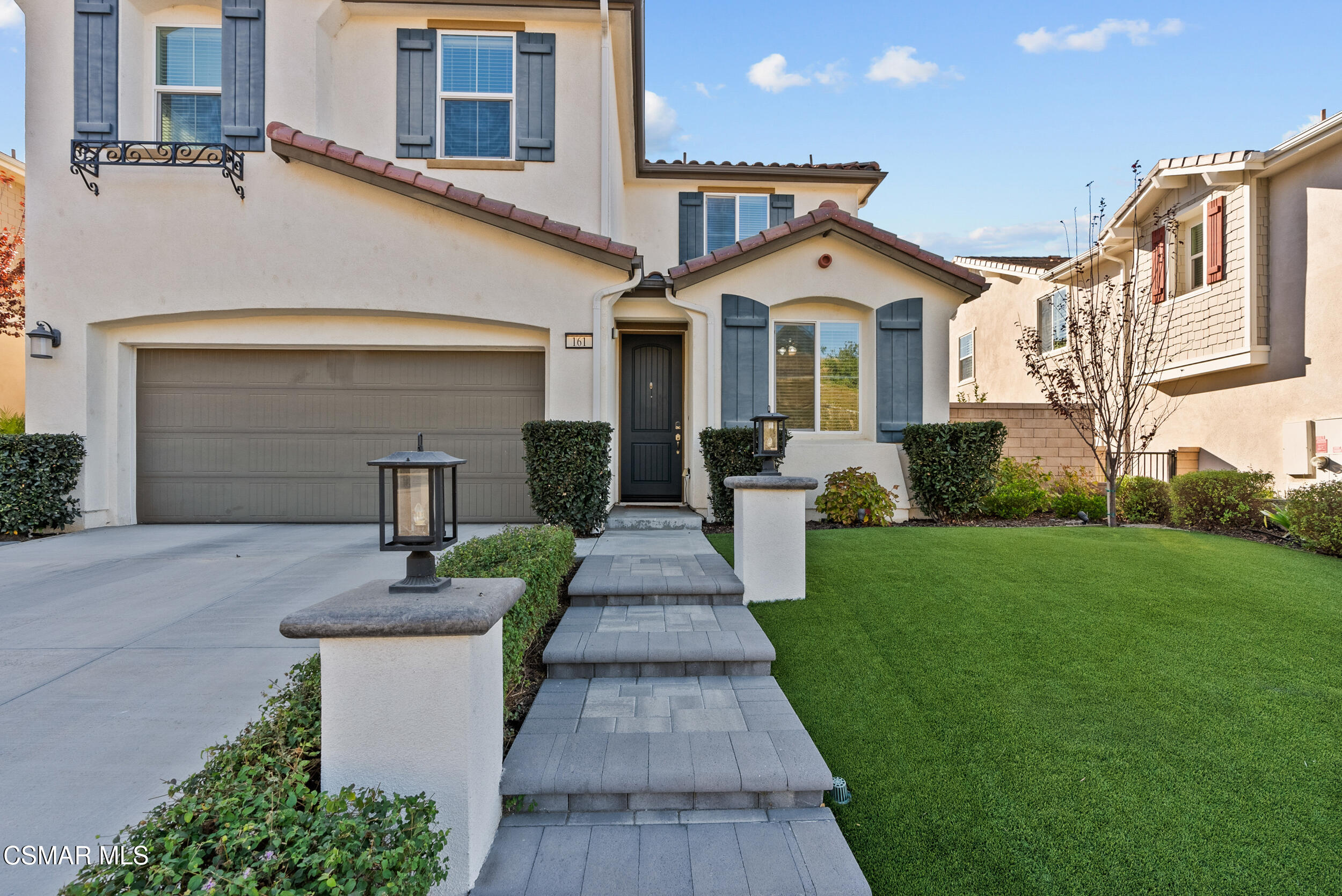 161 White Bark Lane Simi Valley, CA 93065 - Photo 6 of 83 a front view of a house with garden