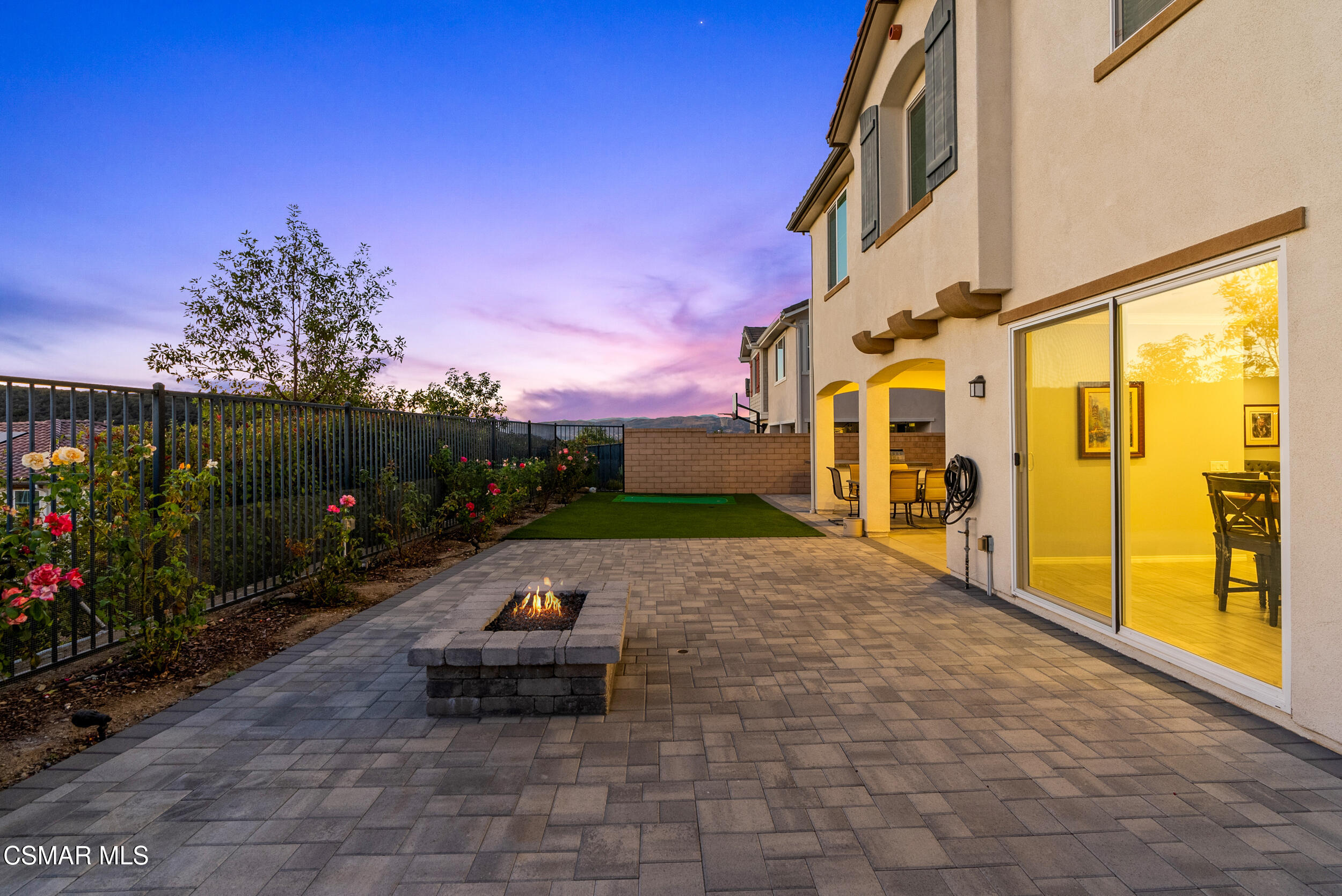 161 White Bark Lane Simi Valley, CA 93065 - Photo 10 of 83 a backyard of a house with table and chairs
