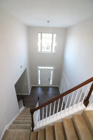 a view of backyard with green space