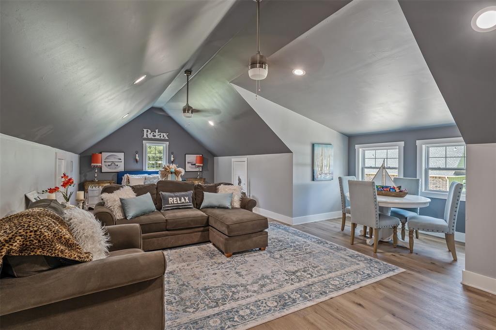 16241 Big Oak Bay Road Tyler, TX 75707 - Photo 26 of 40 Vaulted ceiling room featuring wood-finish flooring and recessed lighting