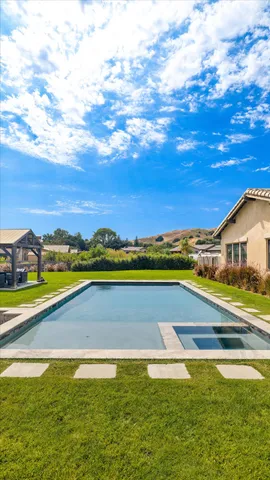 a view of a house with patio