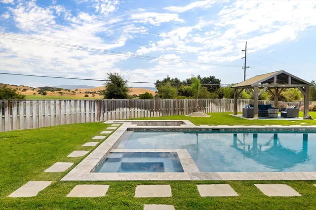 a view of an outdoor dining space with furniture
