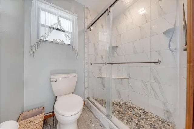 a utility room with sink dryer and washer
