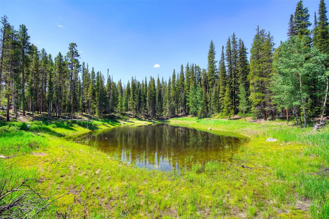 158 Bryce Estates Road Breckenridge, CO 80424 - Photo 8 of 36 a view of a lake with houses in the background