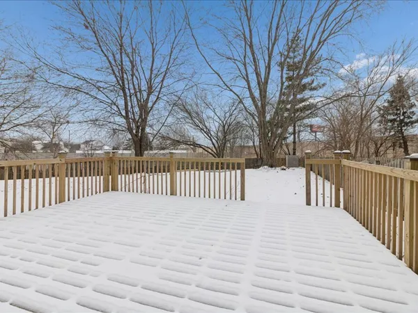 a view of a wooden fence