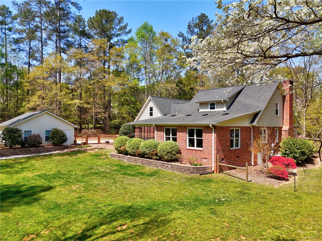 1010 Ridgeview Drive Pendleton, SC 29670 - Photo 43 of 47 This classic brick residence features a spacious yard and detached garage, perfect for outdoor enjoyment.