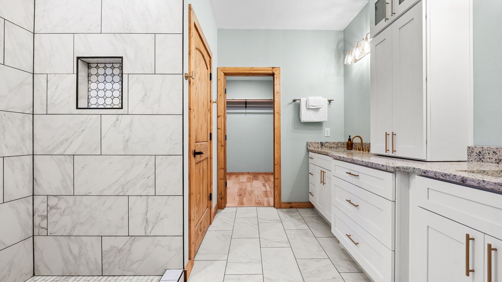269 Old Orchard Road Ellijay, GA 30536 - Photo 8 of 17 a bathroom with a sink and a mirror