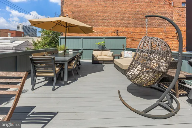 an outdoor space with furniture