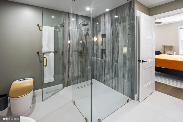 a bathroom with a sink and mirror