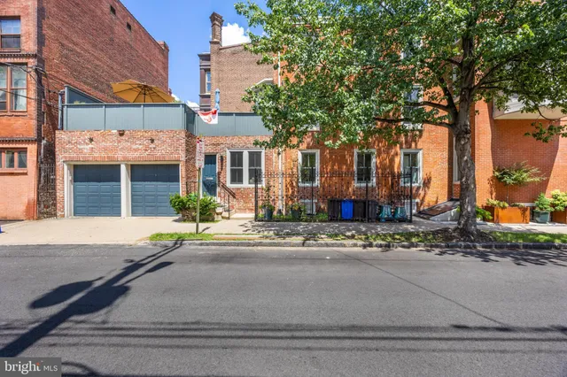 front view of a building with a street