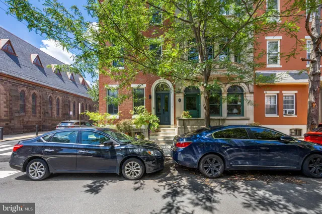 a car parked in front of a house