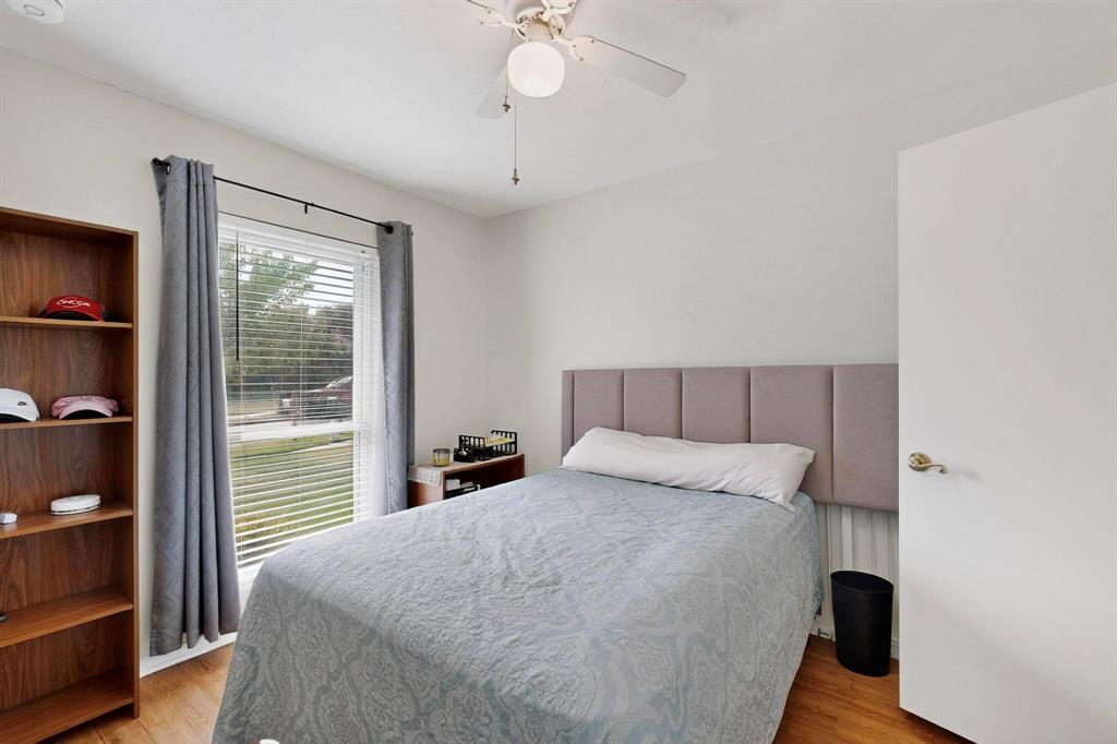 4324 Mesa View Drive Mesquite, TX 75150 - Photo 21 of 39 a bedroom with a bed and a large window