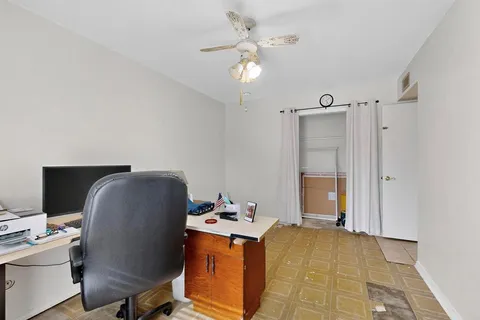 a workspace with a chandelier