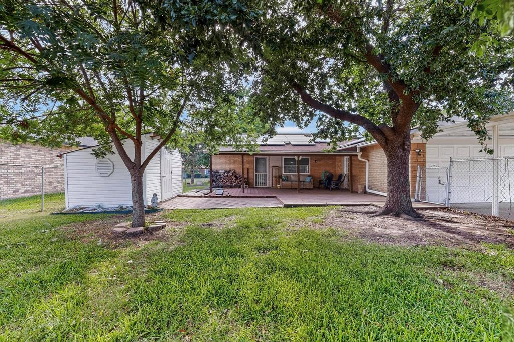 4324 Mesa View Drive Mesquite, TX 75150 - Photo 34 of 39 a front view of a house with garden