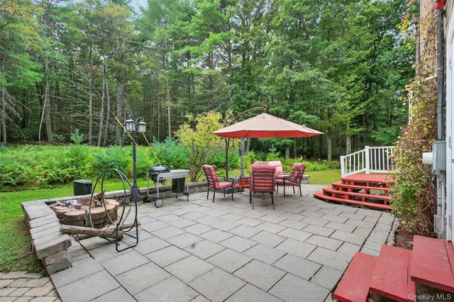 an aerial view of a house with a yard and garden