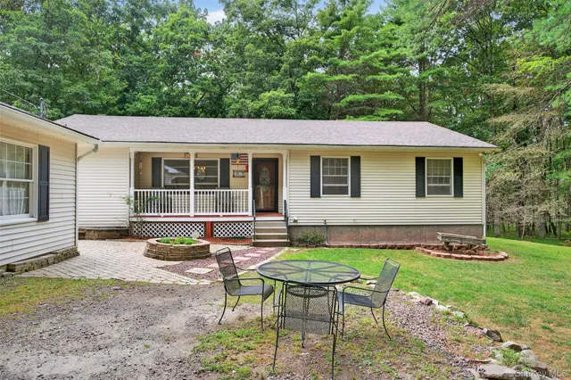 a view of a porch with a backyard