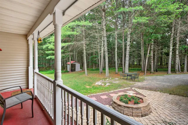 a house view with a backyard space
