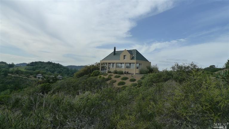 9800 St Helena Road St. Helena, CA 94574 - Photo 1 of 1 a front view of a house with a yard and tree s