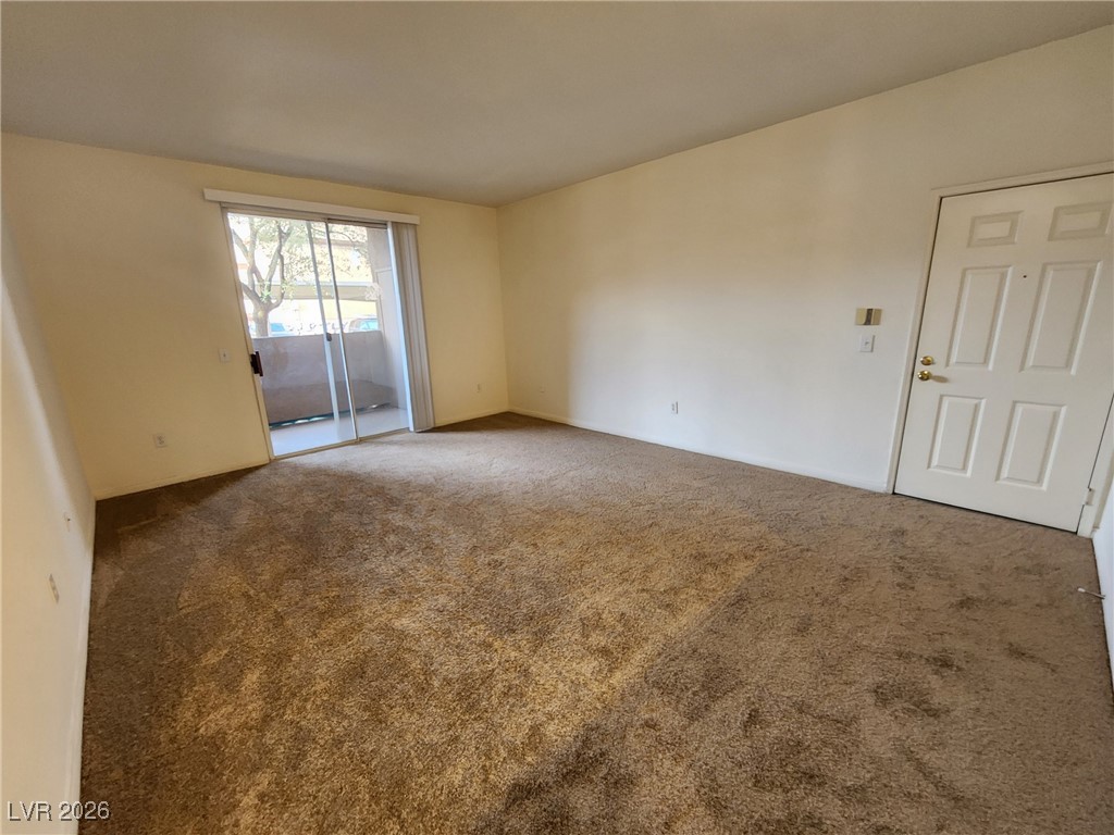 231 West Horizon Ridge Parkway, Unit 417 Henderson, NV 89012 - Photo 4 of 45 Spare room featuring carpet floors