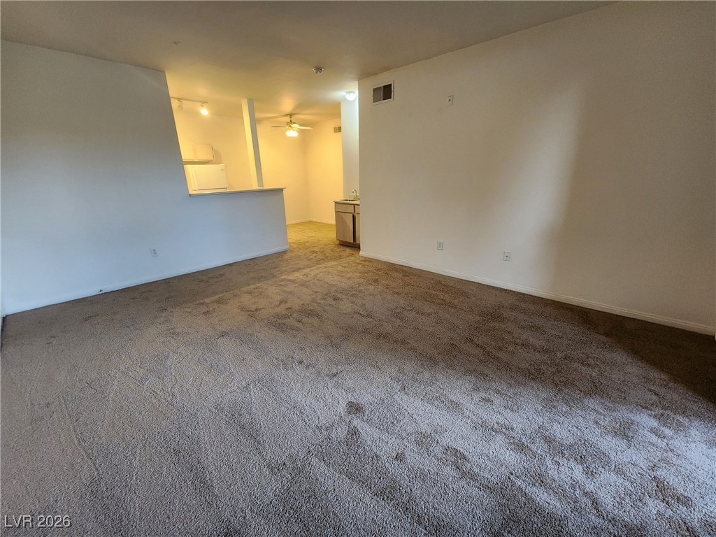 231 West Horizon Ridge Parkway, Unit 417 Henderson, NV 89012 - Photo 6 of 45 View of carpeted empty room