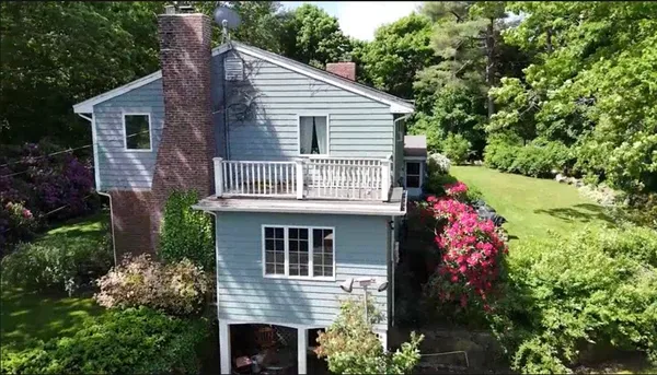 a front view of a house with a porch
