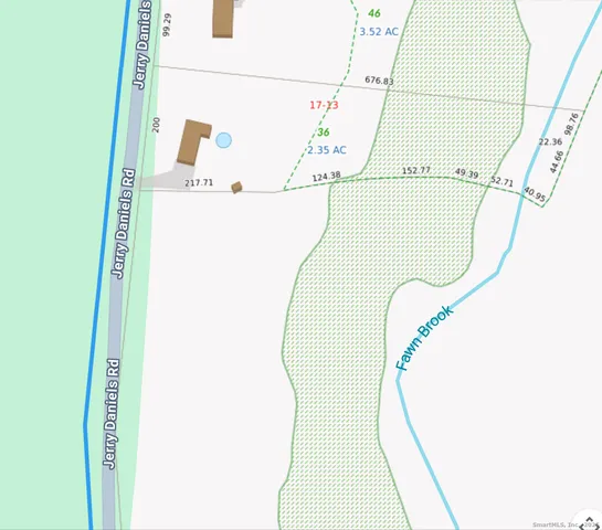 a view of staircase with railing and white walls