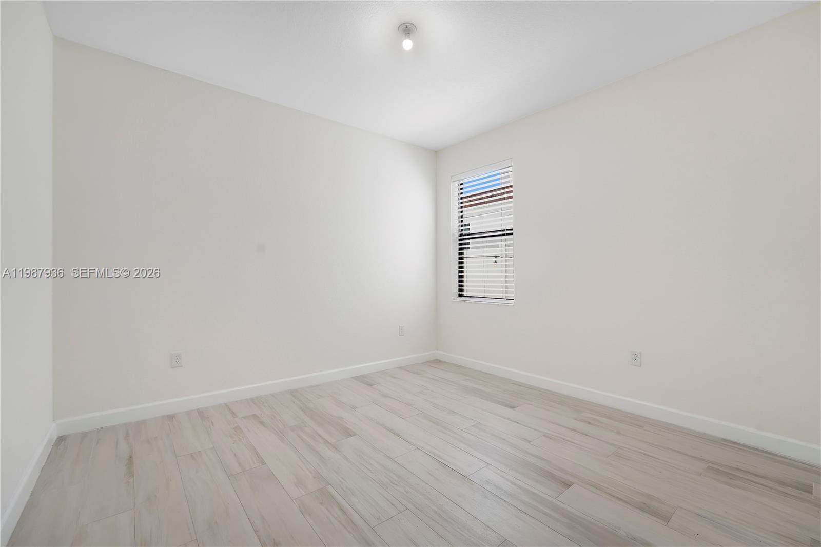 10521 West 35th Way Hialeah, FL 33018 - Photo 12 of 53 The bedroom on the ground floor