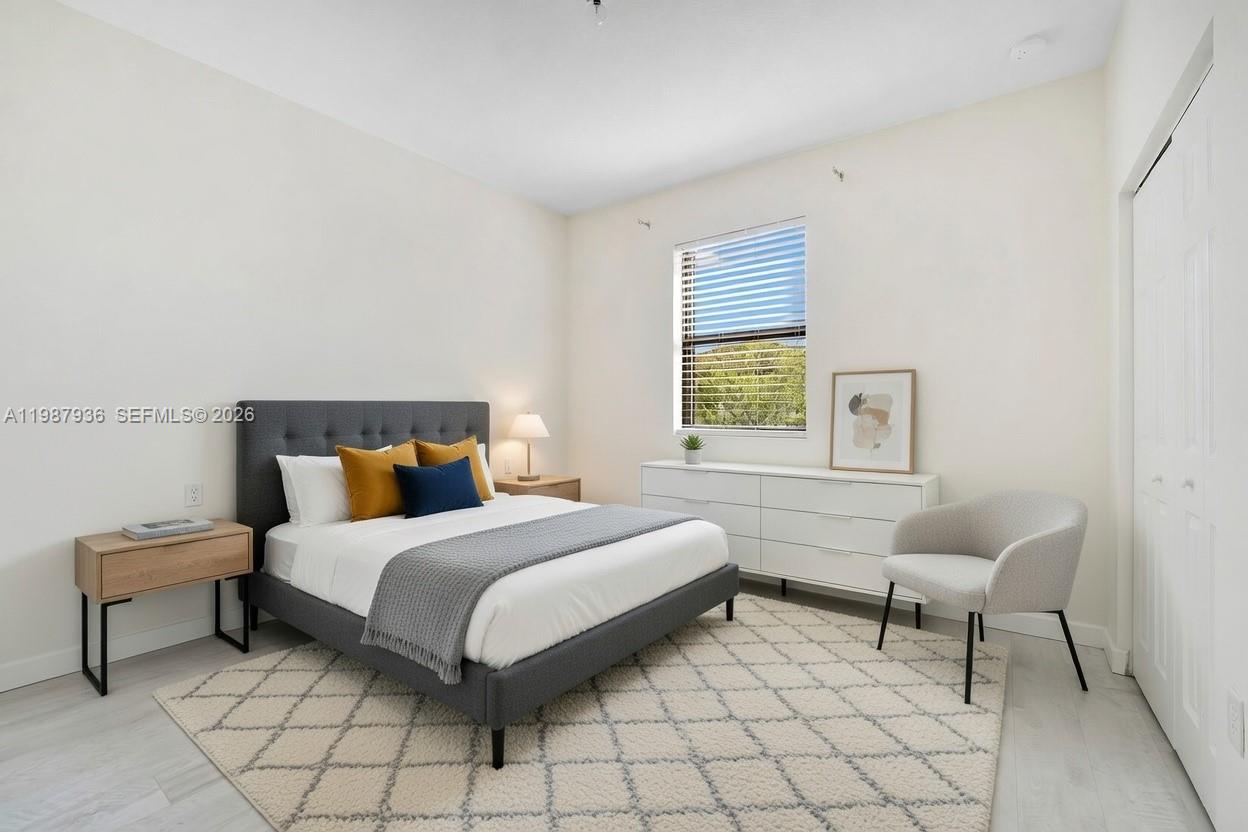 10521 West 35th Way Hialeah, FL 33018 - Photo 16 of 53 AI-staged second floor bedroom