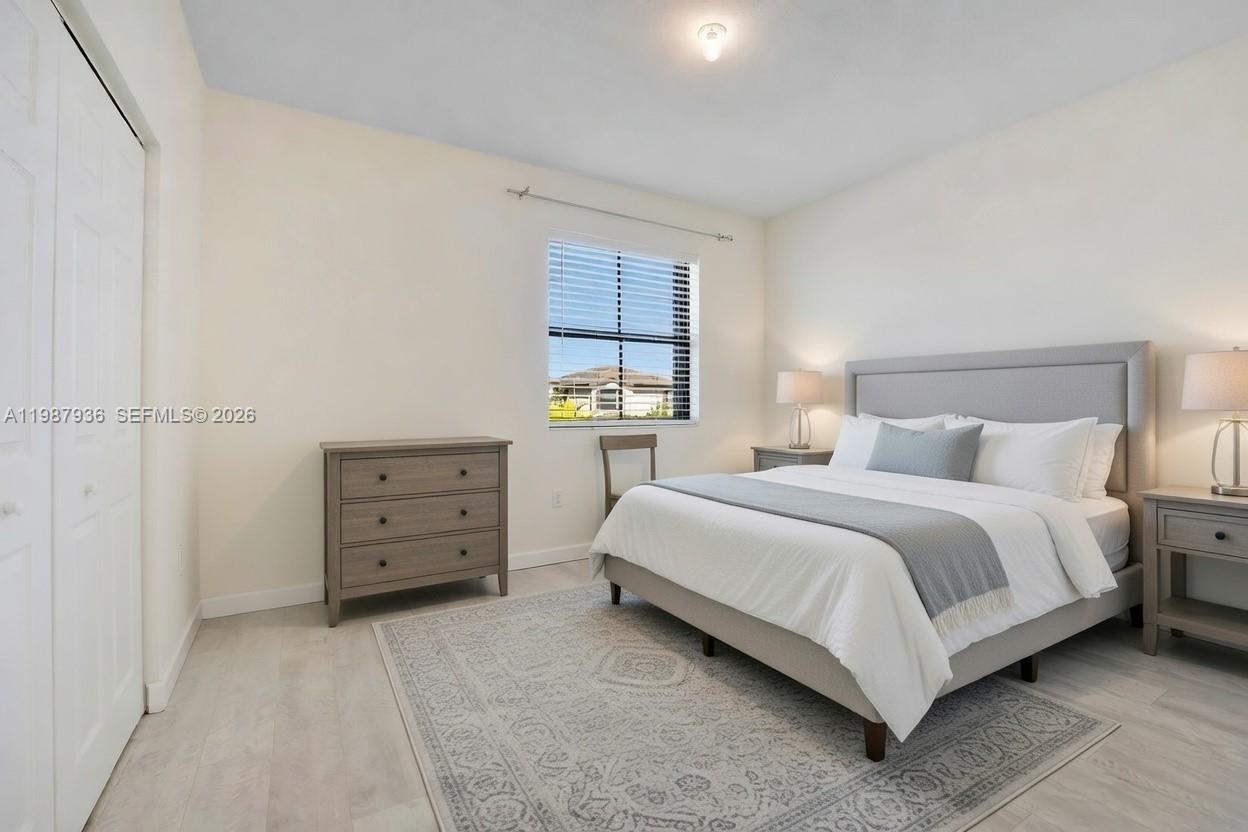 10521 West 35th Way Hialeah, FL 33018 - Photo 18 of 53 AI-staged bedroom 2 -second floor