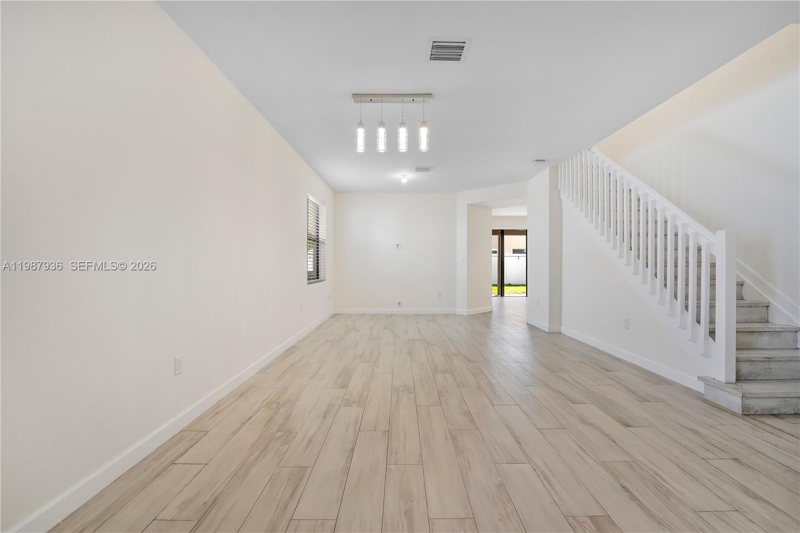10521 West 35th Way Hialeah, FL 33018 - Photo 2 of 53 Living room/dinning room area