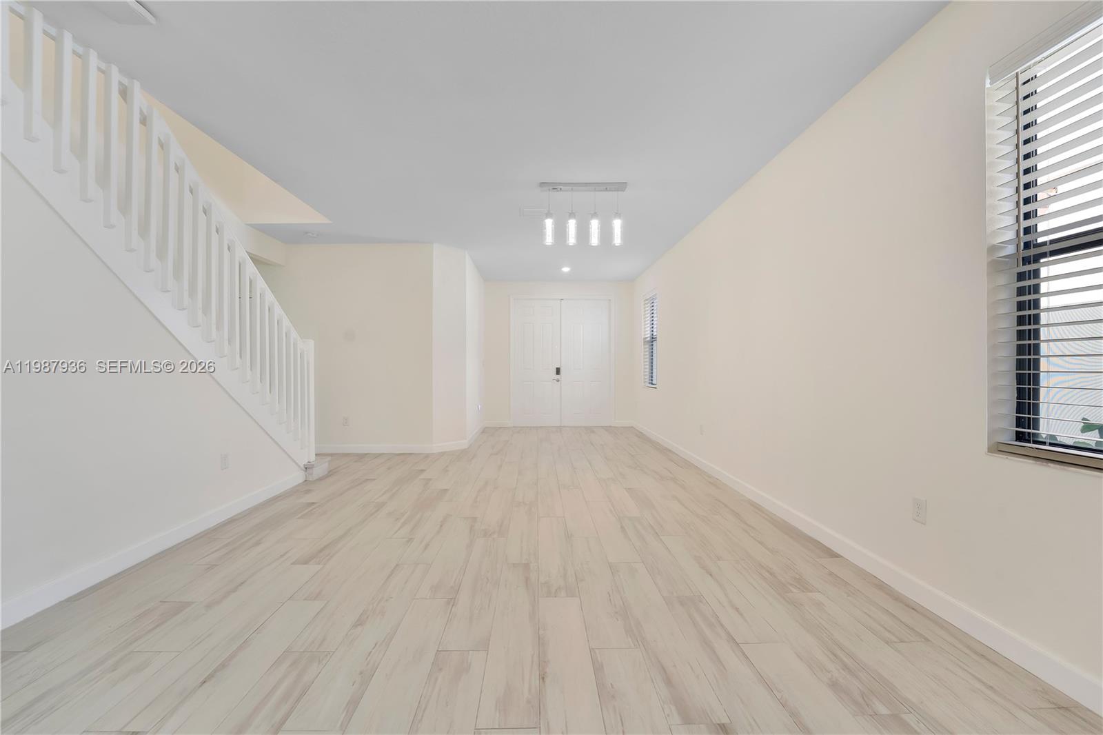 10521 West 35th Way Hialeah, FL 33018 - Photo 6 of 53 Living room / dinning room area