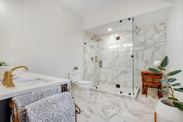 a bathroom with a sink and a shower