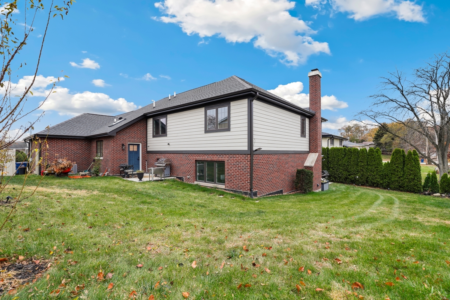 8318 West 91st Street Hickory Hills, IL 60457 - Photo 25 of 29 a view of a house with a yard