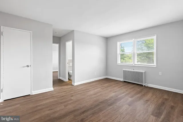 a kitchen with stainless steel appliances a stove a microwave and a refrigerator