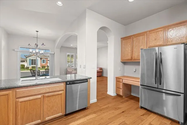 a front view of a house with outdoor seating