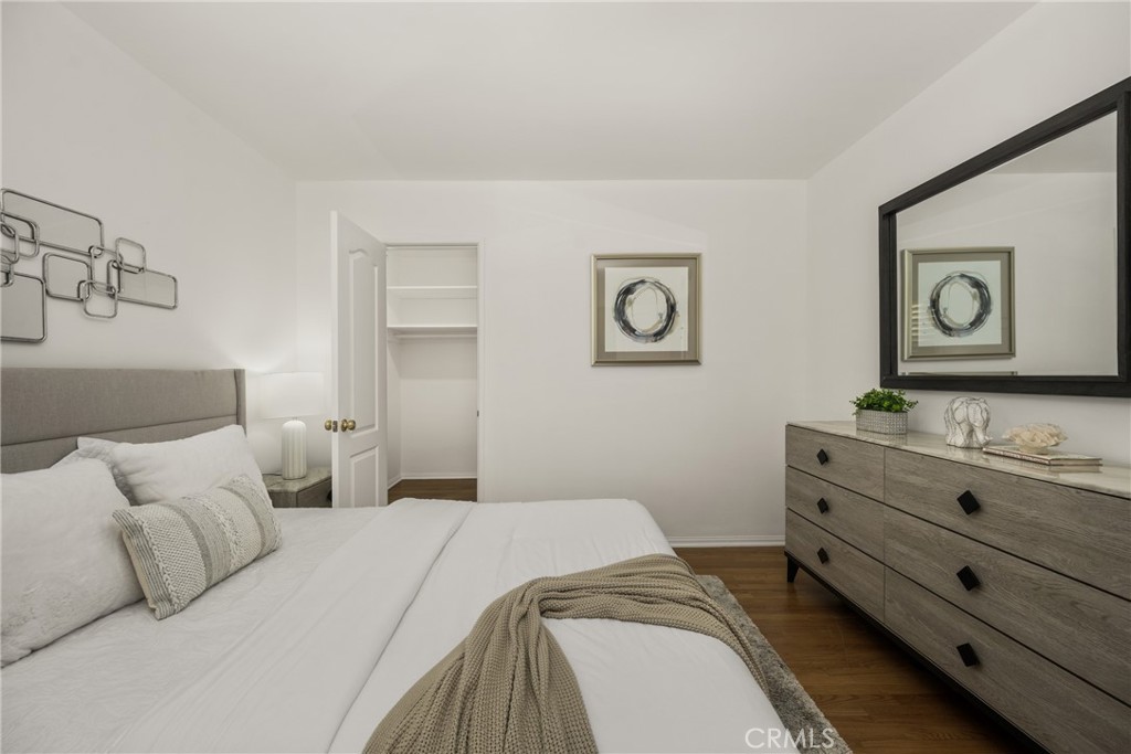 1225 Wabash Street Pasadena, CA 91103 - Photo 21 of 43 a bedroom with a bed and wall painting