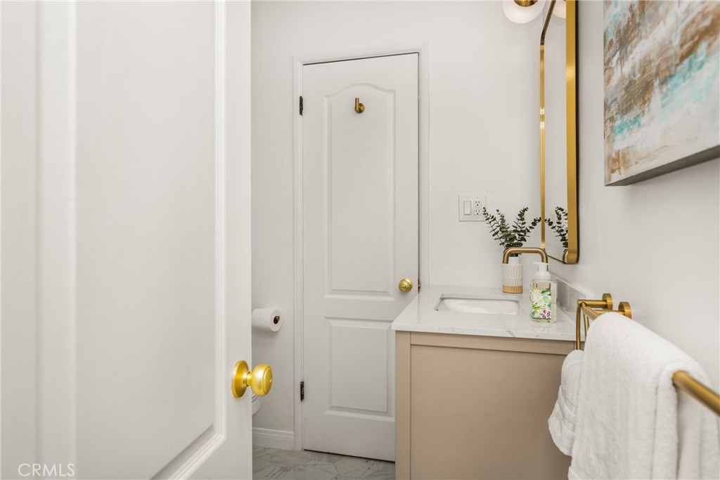 1225 Wabash Street Pasadena, CA 91103 - Photo 23 of 43 a bathroom with a sink and a mirror