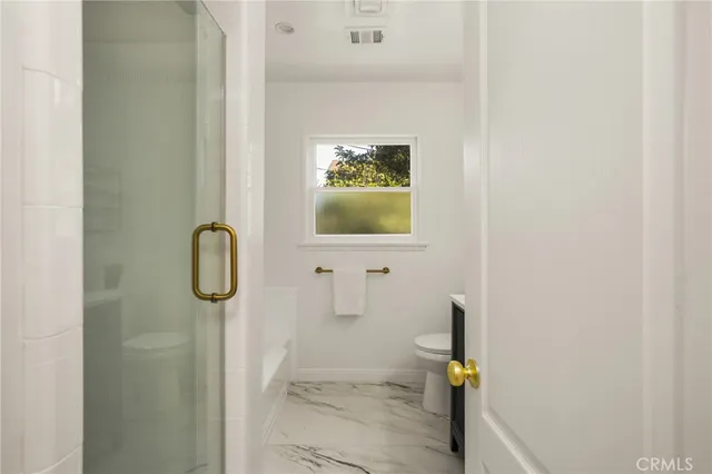 a bathroom with a mirror