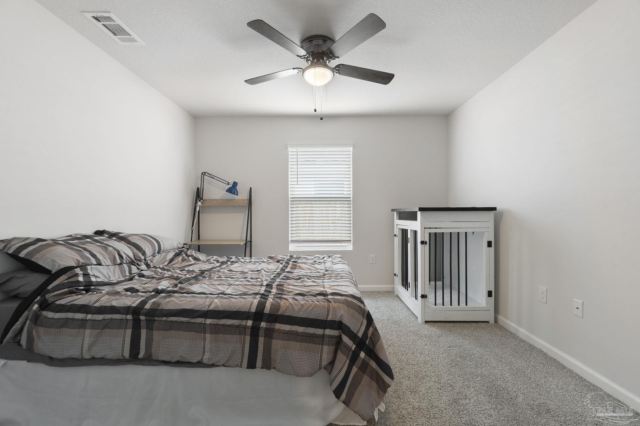 4358 Redbay Court Pace, FL 32571 - Photo 23 of 47 a bedroom with furniture and a window