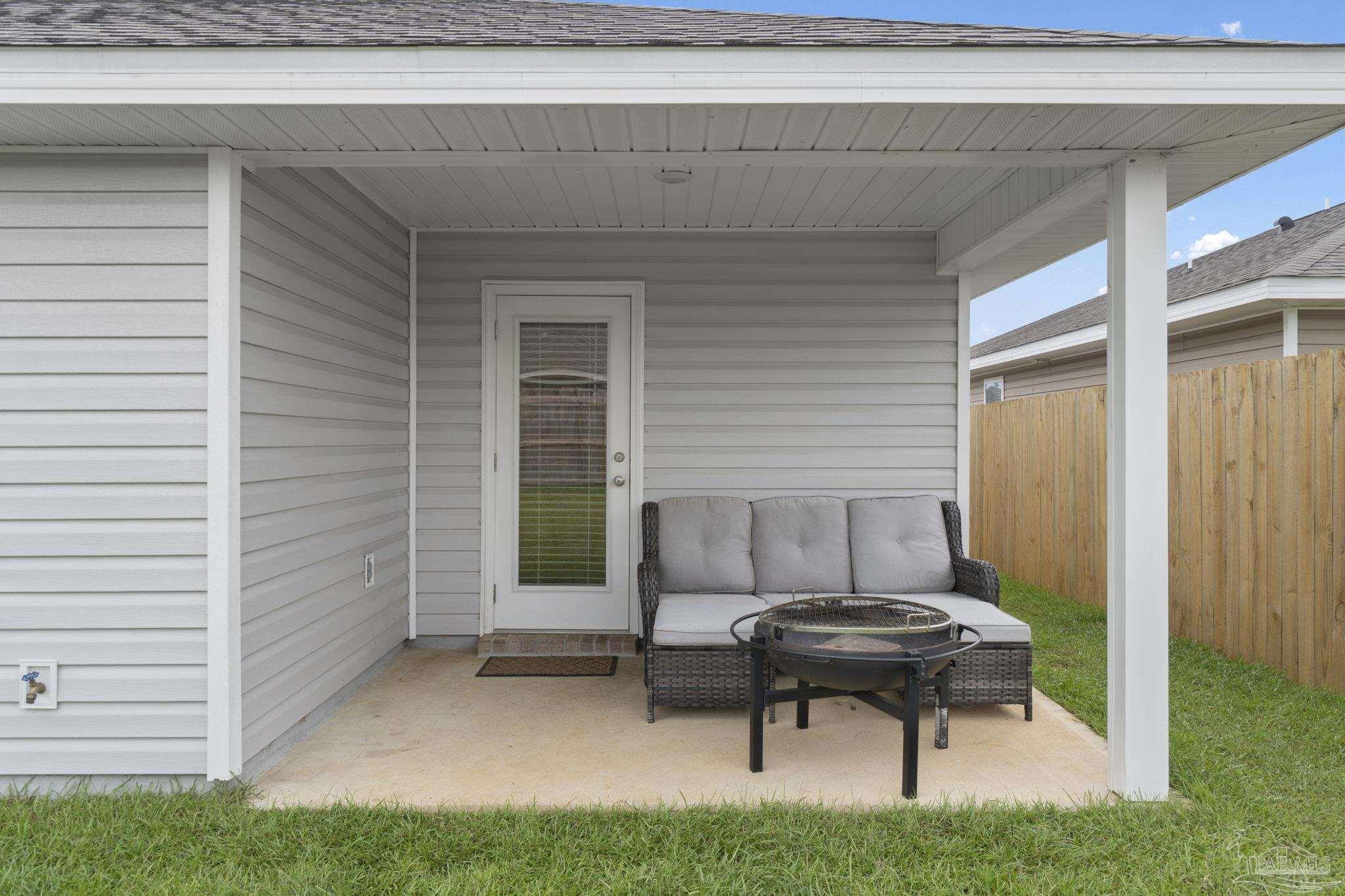 4358 Redbay Court Pace, FL 32571 - Photo 33 of 47 a house view with a outdoor seating