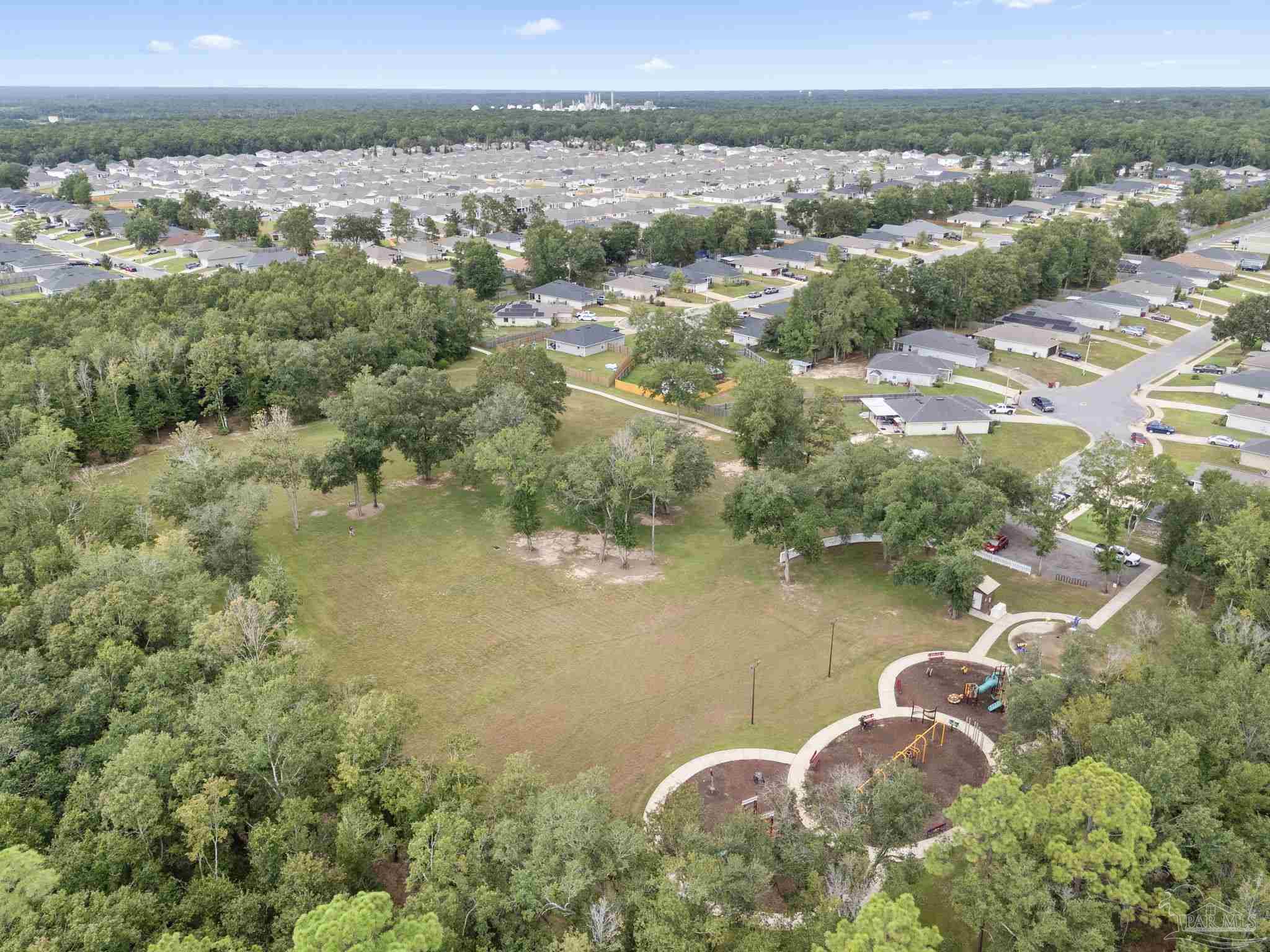 4358 Redbay Court Pace, FL 32571 - Photo 40 of 47 an aerial view of a house with a lake view