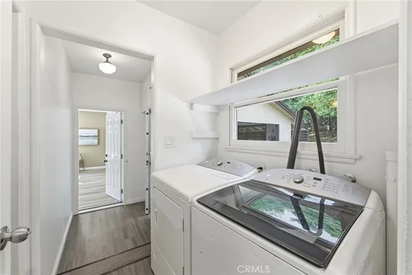 a outdoor space with patio the couches and a dining table with garden view