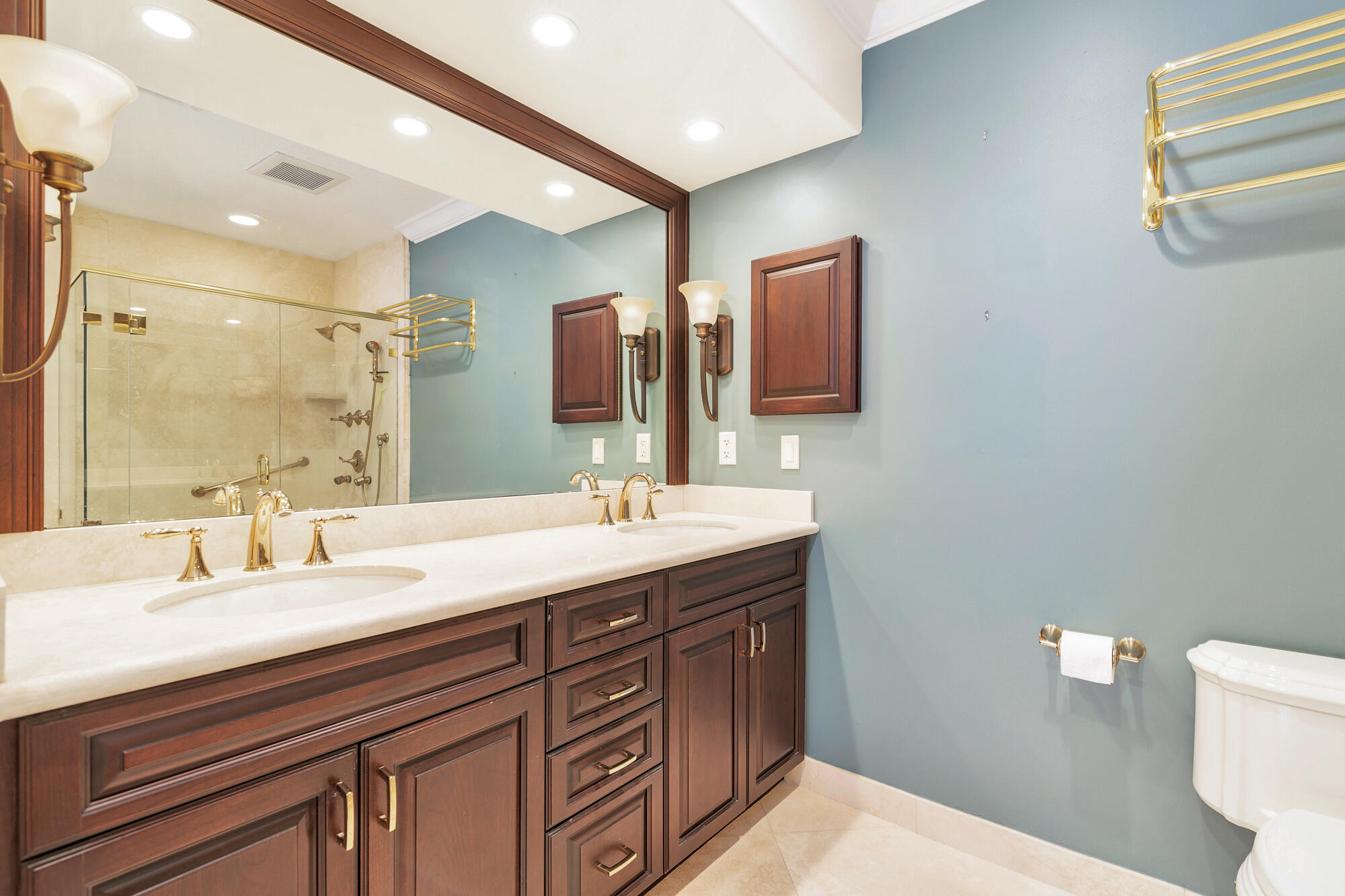 5505 North Ocean Boulevard, Unit 15204 Ocean Ridge, FL 33435 - Photo 17 of 34 a bathroom with a double vanity sink mirror and